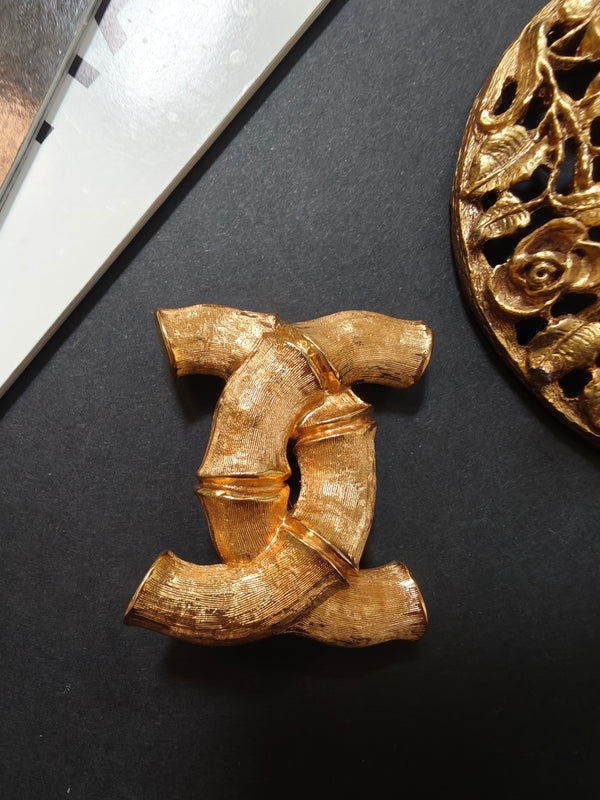 vintage chanel 1980s bamboo gold brooch